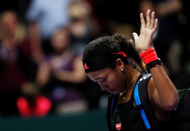 Japan's Naomi Osaka reacts after losing her group stage match against Germany's Angelique Kerber REUTERS/Edgar Su