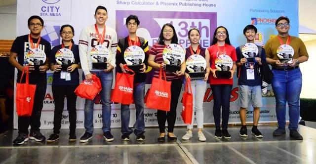 New Sudoku Grandmaster Kaye Janelle Yao (fifth from left) with the other winners in the category of the 13th Philippine Sudoku Super Challenge (PSSC) national finals held on Nov. 24 at SM City Sta. Mesa. Photo courtesy of MTG