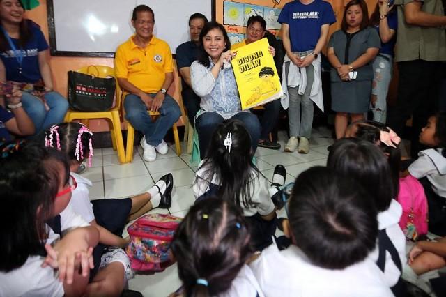 For the last part of her Metro Laylayan program in Tondo, Manila on Tuesday, November 6, 2018, Vice President Leni Robredo pays a surprise visit to the students of Barangay 58 Day Care Center in Pritil, Tondo. Here, she reads the kids a book titled 'Digong Dilaw' about a boy who had the power to turn everything into the color yellow. The Office of the Vice President also turned over school supplies for 50 students. OVP