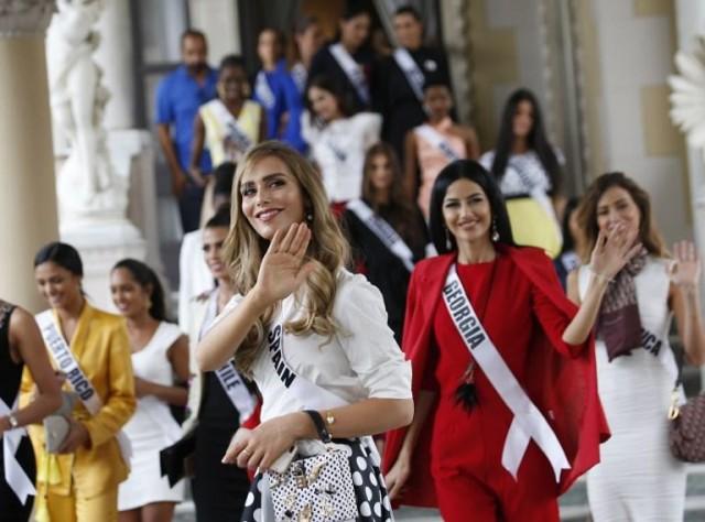 Miss Spain Angela Ponce, the first transgender woman to take part in the Miss Universe contest (C) and other Miss Universe 2018 contestants visit the Government House after their meeting with Thai Prime Minister in Bangkok on December 11, 2018. NARONG SANGNAK / POOL / AFP