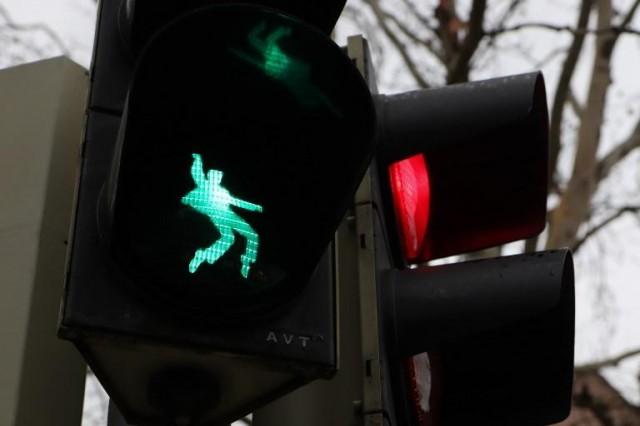 A pedestrian traffic light customized with a dancing Elvis Presley is pictured in Friedberg, western Germany, on December 7, 2018. Yann Schreiber / AFP