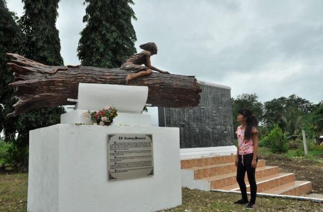 Sendong Memorial of a girl who survived the floods by riding on a log. PHOTO BY MERLYN MANOS