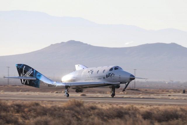 Virgin Galactic's manned space tourism rocket plane SpaceShipTwo lands at Mojave Air and Space Port after returning from a space test flight in Mojave, California, US, December 13, 2018. Virgin Galactic/Handout via REUTERS