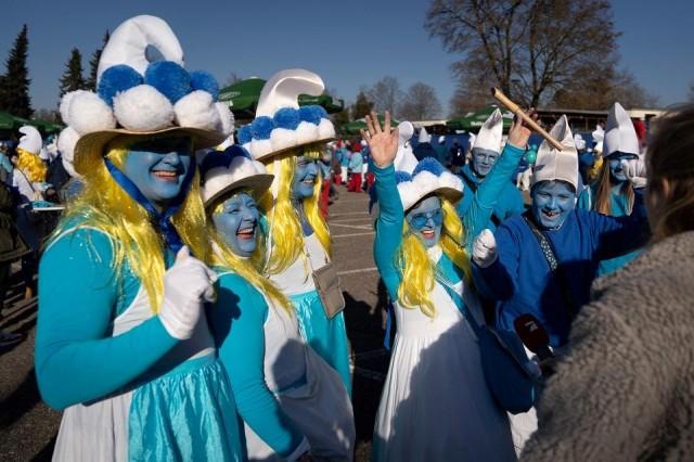 Participants talk to the press during a gathering of people dressed as smurfs to be counted as part of a world record attempt on February 16, 2019 in Lauchringen, Germany. Constant Forme-Becherat/AFP