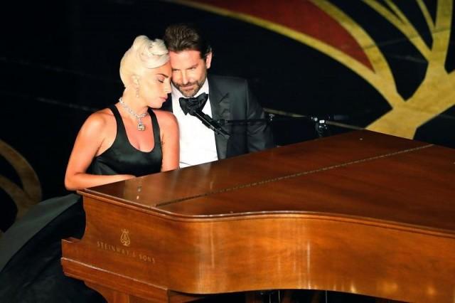 ady Gaga and Bradley Cooper perform "Shallow" from "A Star Is Born." REUTERS/Mike Blake