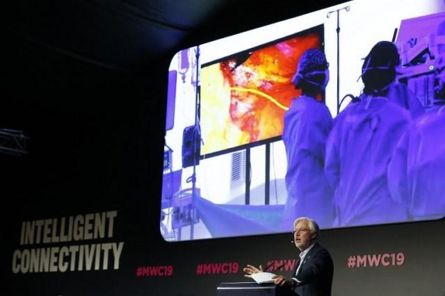Dr. Antonio Lacy of Hospital Clinic de Barcelona delivers a speech about the first 5G tele-mentored live surgery at the Mobile World Congress (MWC) in Barcelona on February 27, 2019. Pau Barrena / AFP
