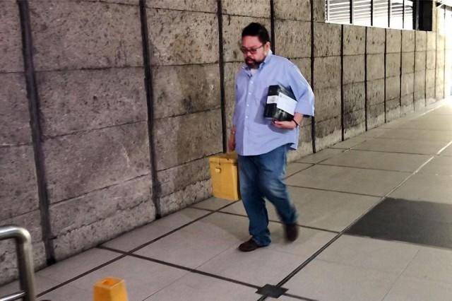 Comelec spokesperson James Jimenez arrives at the Bangko Sentral ng Pilipinas in Manila on Friday, February 8, 2019 with the source codes for #Eleksyon2019. The source codes, which were initially kept inside the Comelec vault, will now be stored in the BSP vault. Tina Panganiban-Perez