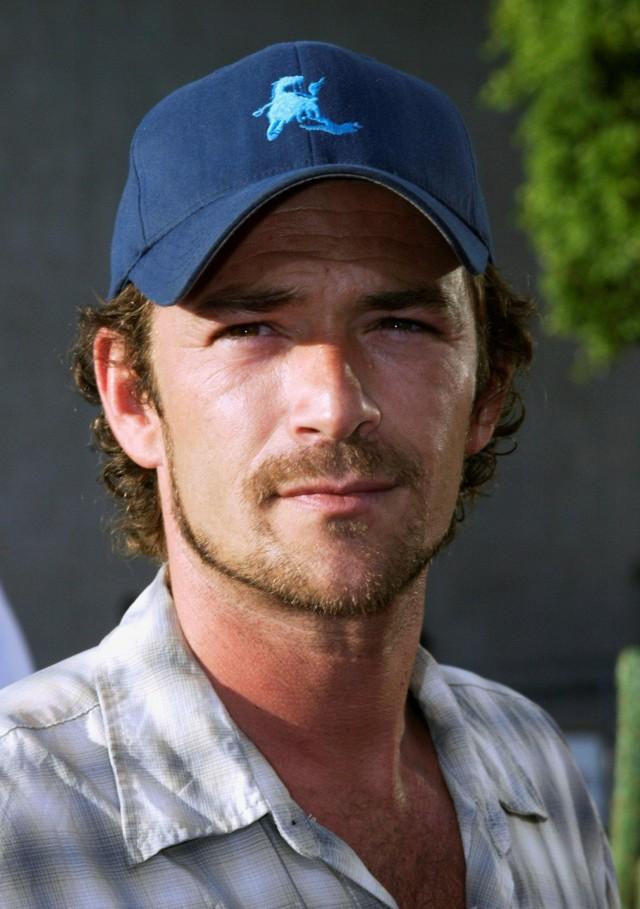 File photo of actor Luke Perry as a guest at the premiere of the new Western film "Open Range" in Hollywood, California, US August 11, 2003. REUTERS/Fred Prouser