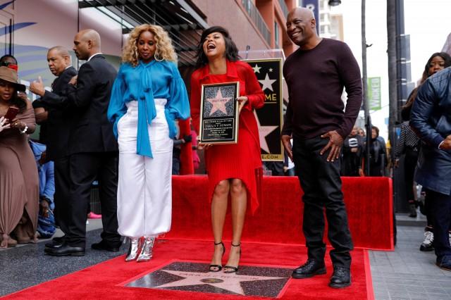 File photo of actor Taraji P. Henson with Mary J. Blige and director John Singleton after receiving a star on Hollywood's Walk of Fame in Los Angeles, California, U.S., January 28, 2019. REUTERS/Mike Blake