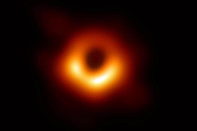 The first ever photo of a black hole, taken using a global network of telescopes conducted by the Event Horizon Telescope (EHT) project, is shown in this handout released on April 10, 2019. EHT/National Science Foundation/via Reuters 