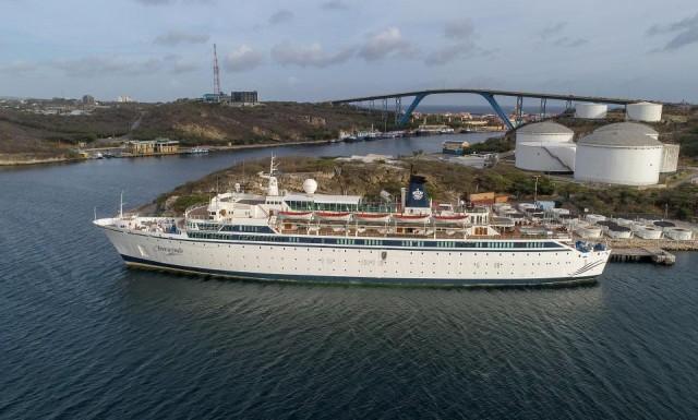 Aerial view of the Freewinds, a Scientology cruise ship, anchored in Willemstad, Curacao, on May 4, 2019, upon arrival from St. Lucia, where it had been quarantined because of a measles case. Raino Mauricia/AFP