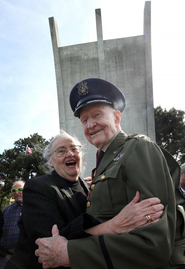 Gail Halvorsen hugs Mercedes Wild on the sidelines of the wreath-laying ceremony at the Berlin Airlift memorial outside Tempelhof airport in Berlin on May 12, 2019. Wolfgang Kumm/dpa/AFP