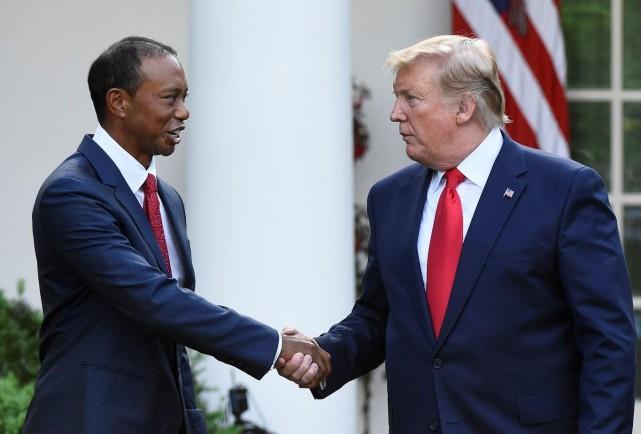 Golfer Tiger Woods is awarded the Presidential Medal of Freedom, the nation's highest civilian honor, by U.S. President Donald Trump in the Rose Garden at the White House in Washington, U.S., May 6, 2019. REUTERS/Clodagh Kilcoyne
