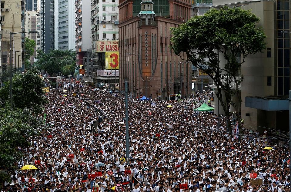 Demonstrators attend a protest to demand authorities scrap a proposed extradition bill with China, in Hong Kong, China June 9, 2019. REUTERS/Thomas Peter