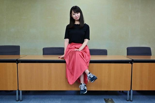 Yumi Ishikawa, leader and founder of the KuToo movement, poses after a press conference in Tokyo on June 3, 2019. The group of Japanese women on June 3 submitted a petition to the government to protest what they say is a de-facto requirement for female staff to wear high heels at work. #KuToo is a pun on "kutsu," which can mean either "shoes" or "pain." Charly Triballeau/AFP
