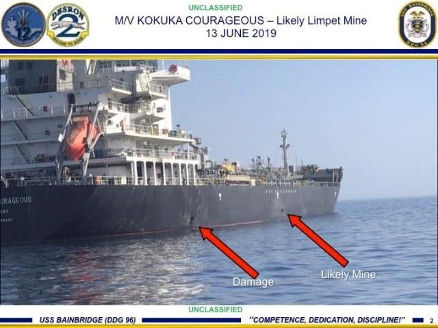 A picture released by US Central Command shows damage from an explosion (L) and a likely limpet mine, on the hull of the civilian vessel M/V Kokuka Courageous in the Gulf of Oman in the Arabian Sea, in waters between Gulf Arab states and Iran, June 13, 2019. Picture taken June 13, 2019. U.S. Navy/Handout via REUTERS