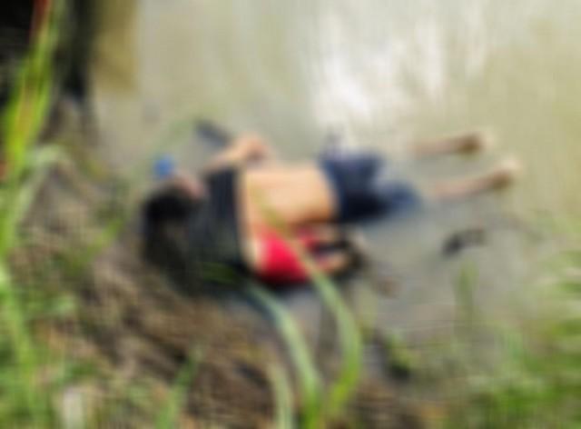 The bodies of Salvadorian migrant Oscar Alberto Martinez Ramirez and his daughter Valeria are seen after they drowned in the Rio Bravo river while trying to reach the United States, in Matamoros, in Tamaulipas state, Mexico June 24, 2019. Picture taken June 24, 2019. REUTERS/Stringer