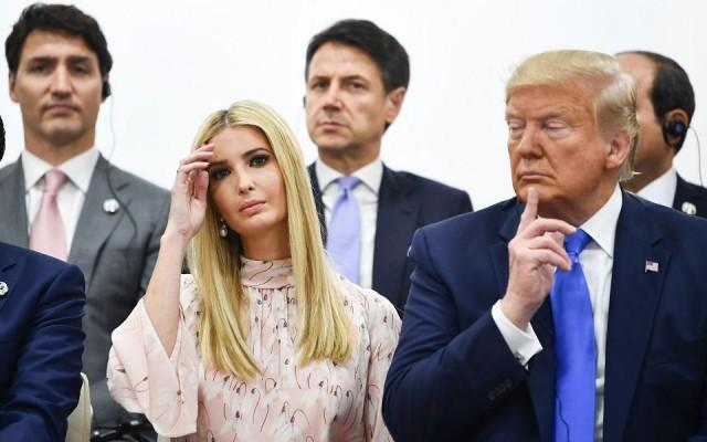 In this file photo taken on June 29, 2019 US President Donald Trump and his daughter, advisor to the President Ivanka Trump, attend an event on women's empowerment during the G20 Summit in Osaka. Brendan Smialowski/AFP