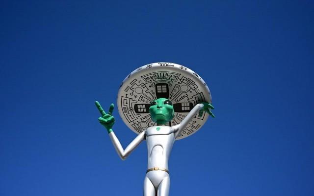 In this file photo taken on March 4, 2019, an alien sculpture lines the side of the road in the town of Baker, California, known as the "Gateway to Area 51." Frederic J. Brown/AFP