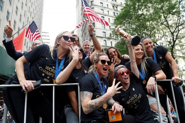 The members of the US women's national soccer team celebrate their World Cup win during a parade in New York City on July 10, 2019. REUTERS/Mike Segar