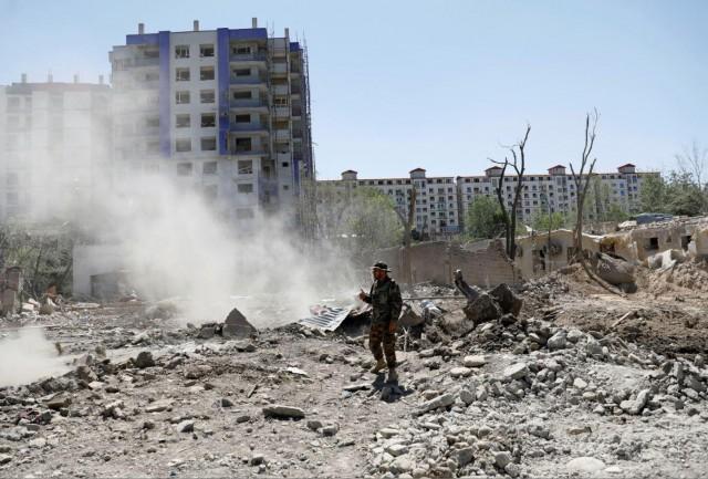 An Afghan National Army (ANA) soldier stands at the site of Monday's blast in Kabul, Afghanistan July 2, 2019. REUTERS/Mohammad Ismail