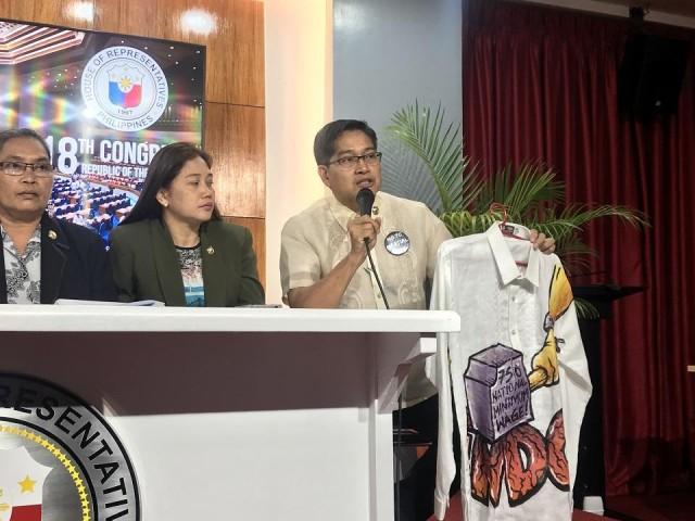 Bayan Muna Party-list Representative Ferdinand Gaite shows the barong he was supposed to wear. "May martial law pala sa House of Representatives," he said.
