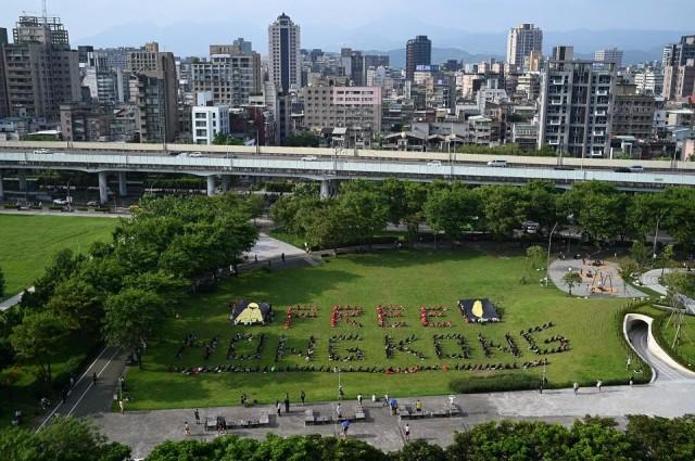 Taiwanese students set up a human sign that reads "Free Hong Kong" during a demonstration to support Hong Kongâ€™s anti extradition bill, in Taipei on August 11, 2019. Sam Yeh/AFP