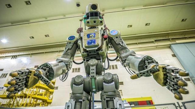 This handout picture taken on July 26, 2019 and released by the official website of the Russian State Space Corporation ROSCOSMOS on August 21, 2019 shows Russian humanoid robot Skybot F-850 (Fedor) being tested ahead of its flight on board Soyuz MS-14 spacecraft at the Baikonur Cosmodrome in Kazakhstan. Roscosmos space agency/AFP