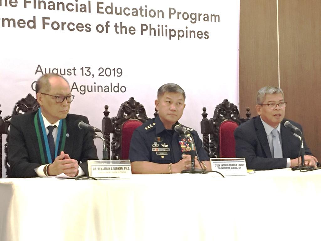 The Bangko Sentral ng Pilipinas (BSP) on Tuesday, August 13, 2016, announced plans to fast-track the process of allowing employees of the Armed Forces of the Philippines (AFP) to invest in government securities. BSP Governor Benjamin Diokno (left) said they are now in talks with the AFP to allow soldiers to invest in treasury bills via salary deduction. Also in photo are Inspector General Lt. Gen. Antonio Ramon Lim (center), and BDO Foundation president Mario Deriquito. JOn Viktor Cabuenas, GMA News
