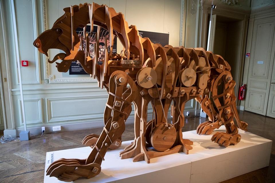 A picture taken on September 11, 2019 shows a mechanical lion that has been recreated 500 years after its invention by Leonardo da Vinci, at the Italian Cultural Institute in Paris. Thomas Samson/AFP