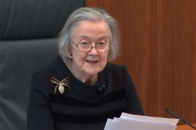 A still image of footage made available for contemporaneous news reporting by the UK Supreme Court on September 24, 2019 shows President of the Supreme Court Brenda Hale, Baroness Hale of Richmond, reading the court's judgement in the Supreme court in central London on September 24, 2019 on the legality of Boris Johnson's advice to the Queen to prorogue, or suspend, parliament for more than a month. UK Supreme Court/AFP