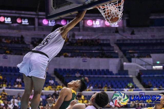 Ricci Rivero of the UP Fighting Maroons finished an alley-oop turnaround from Jun Manzo during the teams game against FEU . PHOTO BY UAAP