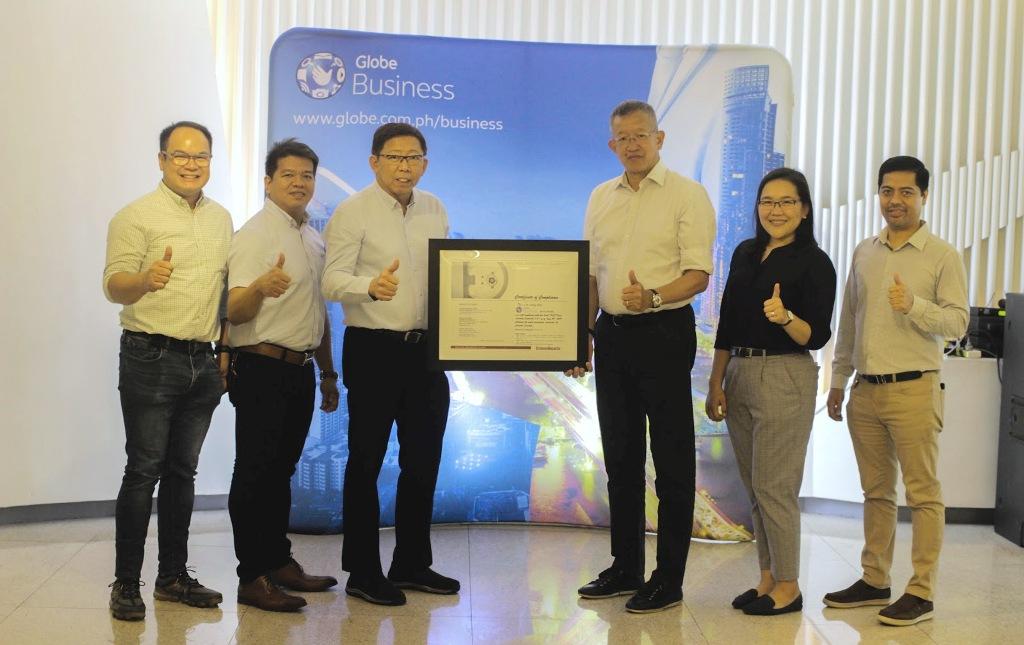 Globe Telecom Inc.â€™s enterprise arm has received the Payment Card Industry Data Security Standard (PCI DSS) compliance certification version 3.2.1 for its data centers in the country, the telco said on Thursday, Sept. 12, 2019. In photo from left are Globe Business product management director JD Montelibano, Globe core network & facilities management director Ronald David , Globe chief technical advisor Robert Tan, Globe Network technical group operations senior vice president Peter Tan, Globe Business support services director Zarina Agorilla , Globe Business IT support center manager Jerome Castro. Globe