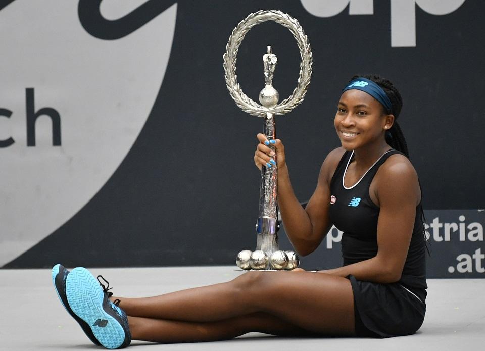 Cori Gauff of US poses with the trophy after she won her WTA-Upper Austria Ladies final tennis match against Jelena Ostapenko of Latvia on October 13, 2019 in Linz, Austria. Barbara Gindl/APA/AFP