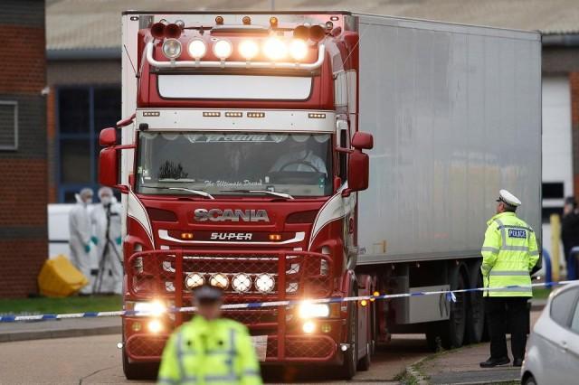 Police move the lorry container where bodies were discovered, in Grays, Essex, Britain October 23, 2019. REUTERS/Peter Nicholls