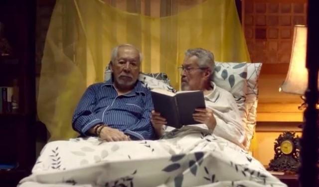 Ramon (Eddie Garcia) reads Fredo (Tony Mabesa) a bedtime story. In Rainbowâ€™s Sunset, Ramon leaves his family to take care of his best friend, Fredo, who is dying of cancer. PHOTO FROM DFA