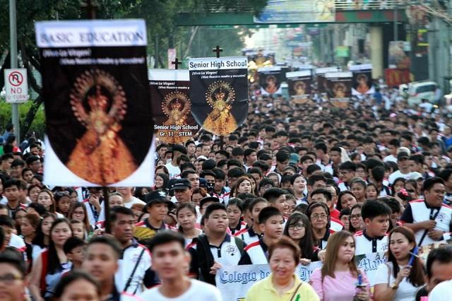 Thousands of devotees came to Sto. Domingo Church on Quezon Avenue to take part in the La Naval de Manila procession on Sunday, October 13, 2019. DANNY PATA