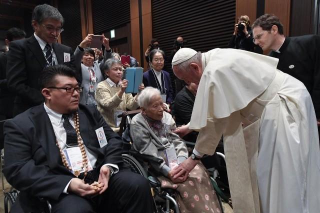 Pope Francis attends a meeting in Tokyo on November 25, 2019 with victims of the "triple disaster" of the 2011 Tohoku earthquake and tsunami and the ensuing the Fukushima nuclear plant meltdown. The Pope called for renewed efforts to help the victims, noting "concern" in the country over the continued use of nuclear power. Handout/Vatican Media/AFP