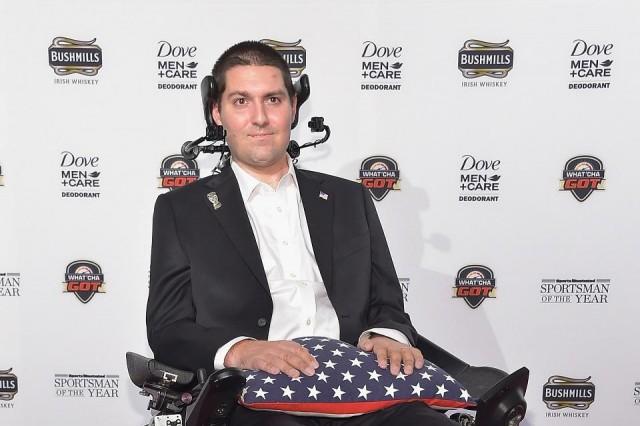 In this file photo taken on December 08, 2014 Pete Frates attends the Sportsman Of The Year 2014 Ceremony on December 9, 2014 in New York City. The former US college baseball player who helped inspire the global phenomenon known as the "ice bucket challenge" to tackle a deadly neurodegenerative disease has died at the age of 34, his family said. Michael loccisano /Getty Images North America/AFP