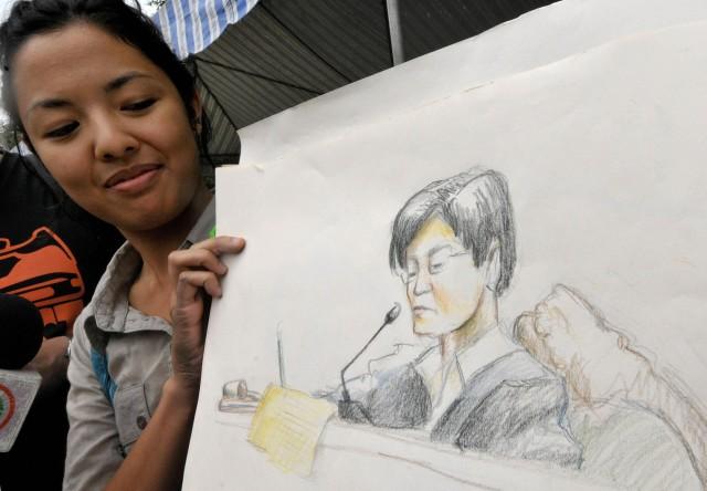 Judge Jocelyn Solis-Reyes is illustrated here by courtroom sketch artist Ala Paredes during the trial of suspect Andal Ampatuan Jr. at the heavily guarded Philippine National Police headquarters in suburban Quezon City, north of Manila, Philipines on Jan. 5, 2009. AP-Aaron Favila
