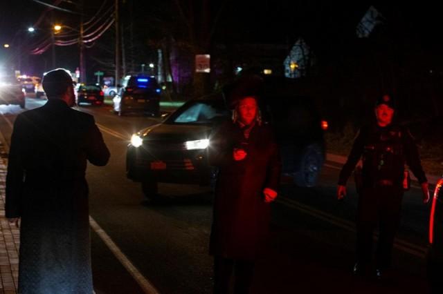 Jewish people try to reach the area where 5 people were stabbed at a Hasidic rabbi's home in Monsey, New York, US, December 29, 2019. REUTERS/Eduardo Munoz