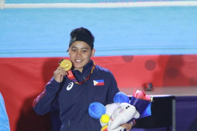 Nesthy Petecio celebrates her gold medal victory. Danny Pata