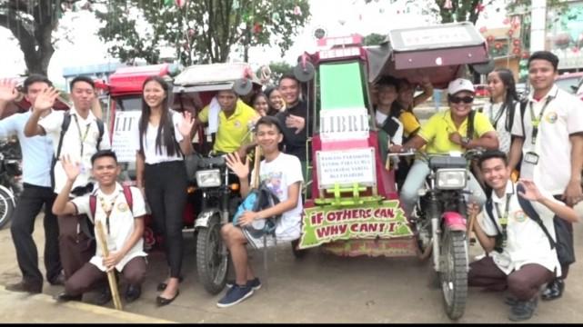 Tricycle drivers Letagem Ornillo and Eddie Fuentes offer free rides to their neighbors in Pagadian City as a Christmas treat. PHOTO BY AUDE HAMPONG