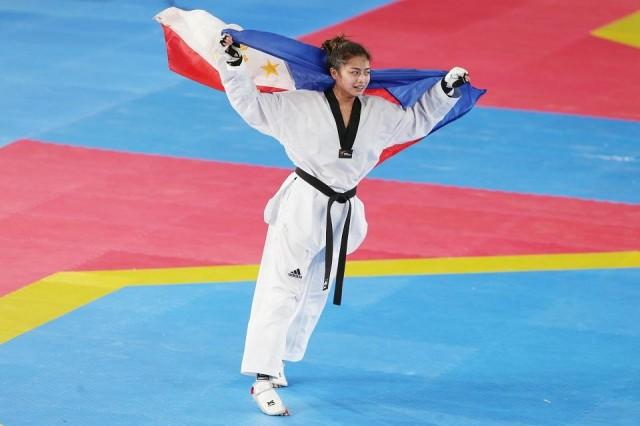Pauline Lopez celebrates after winning the gold in the taekwondo women's under-57kg at the Southeast Asian Games on Sunday, December 8, 2019 at the Rizal Memorial Sports Complex. Zeke Alonzo