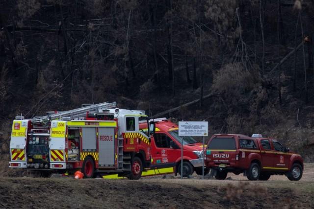 Fire rescue vehicles are seen at the Ben Boyd Reservoir following the crash of a firefighting helicopter, near Boyd Town, Australia January 9, 2020. REUTERS/Alkis Konstantinidis