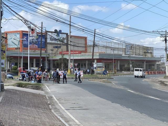 Authorities have opened up the Lemery-Taal bypass road allowing stranded residents and motorists going towards San Jose to pass. This after motorcycle riding residents found a small road bypassing the checkpoint. Photo taken noon of January 23, 2020. Raffy Tima