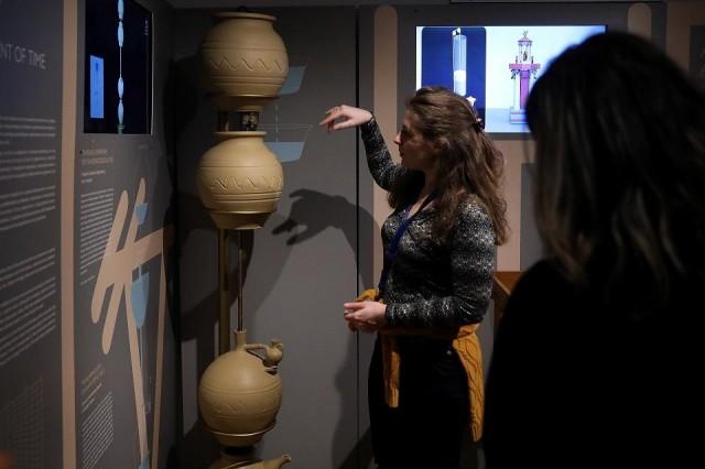 A Kotsanas Museum of Ancient Greek Technology employee presents a replica of the philosopher Plato's alarm clock, in Athens, Greece February 14, 2020. Picture taken February 14, 2020. REUTERS/Costas Baltas