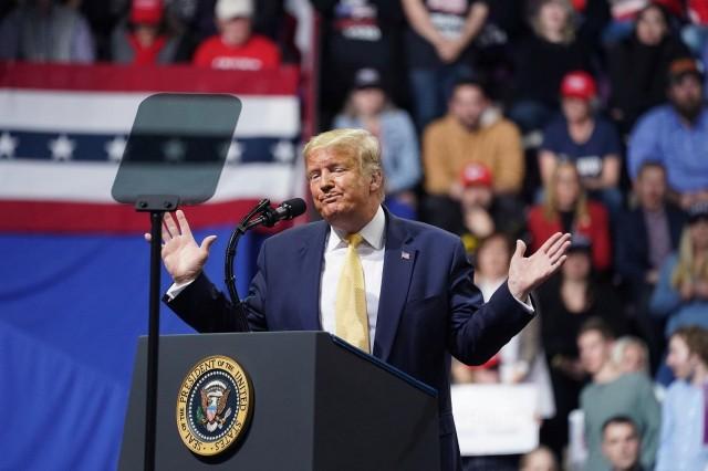 US President Donald Trump gestures as he holds a campaign rally in Colorado, in which he blasted the Oscar win of South Korean film 'Parasite.' REUTERS/Kevin Lamarque