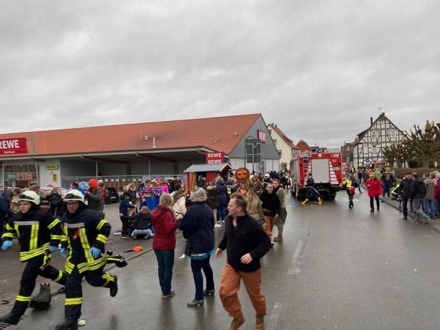 People react at the scene after a car plowed into a carnival parade injuring several people in Volkmarsen, Germany February 24, 2020. Elmar Schulten/Waldeckische Landeszeitung via REUTERS