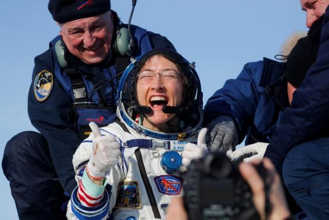 A search and rescue team helps NASA astronaut Christina Koch out of the Soyuz MS-13 space capsule carrying her and International Space Station (ISS) crew members Luca Parmitano and Alexander Skvortsov, after landing in Zhezkazgan, Kazakhstan, February 6, 2020. Sergei Ilnitsky/Pool via REUTERS